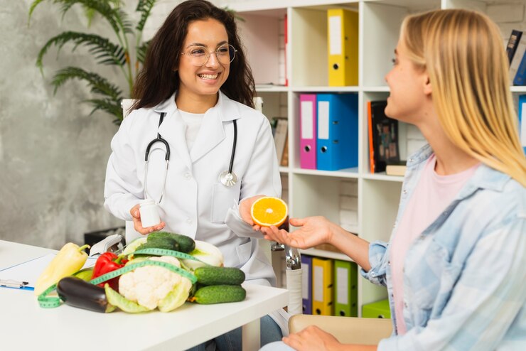 medium-shot-women-talking-about-fruits